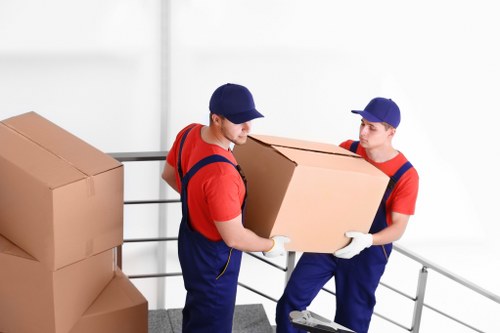 Moving team at Norbury property with protective packing and safety checks